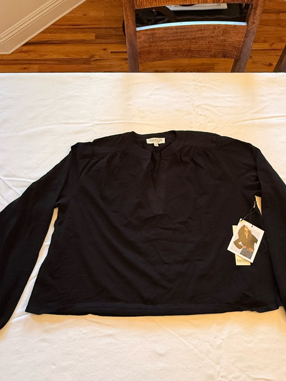 NWT Nation LTD Maya V-Neck Top in Jet Black, a relaxed-fit long-sleeve blouse.